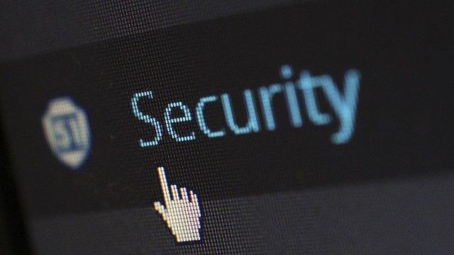 The word "Security" on a computer screen with a mouse cursor hovering over it