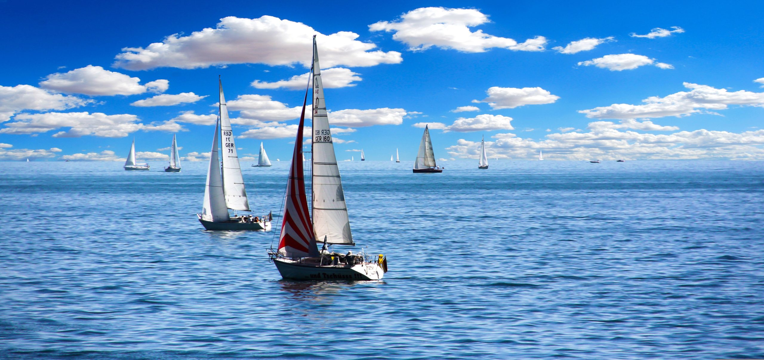 Sail Boats on the Ocean Representing the Wind Element